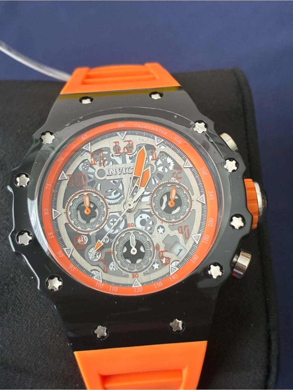 Invicta chronograph visible